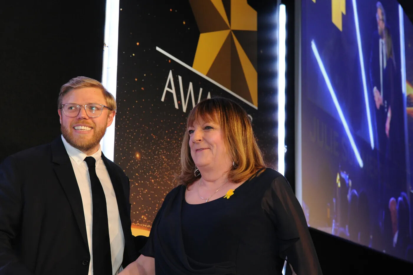Host Rob Beckett and Julie Summerell 